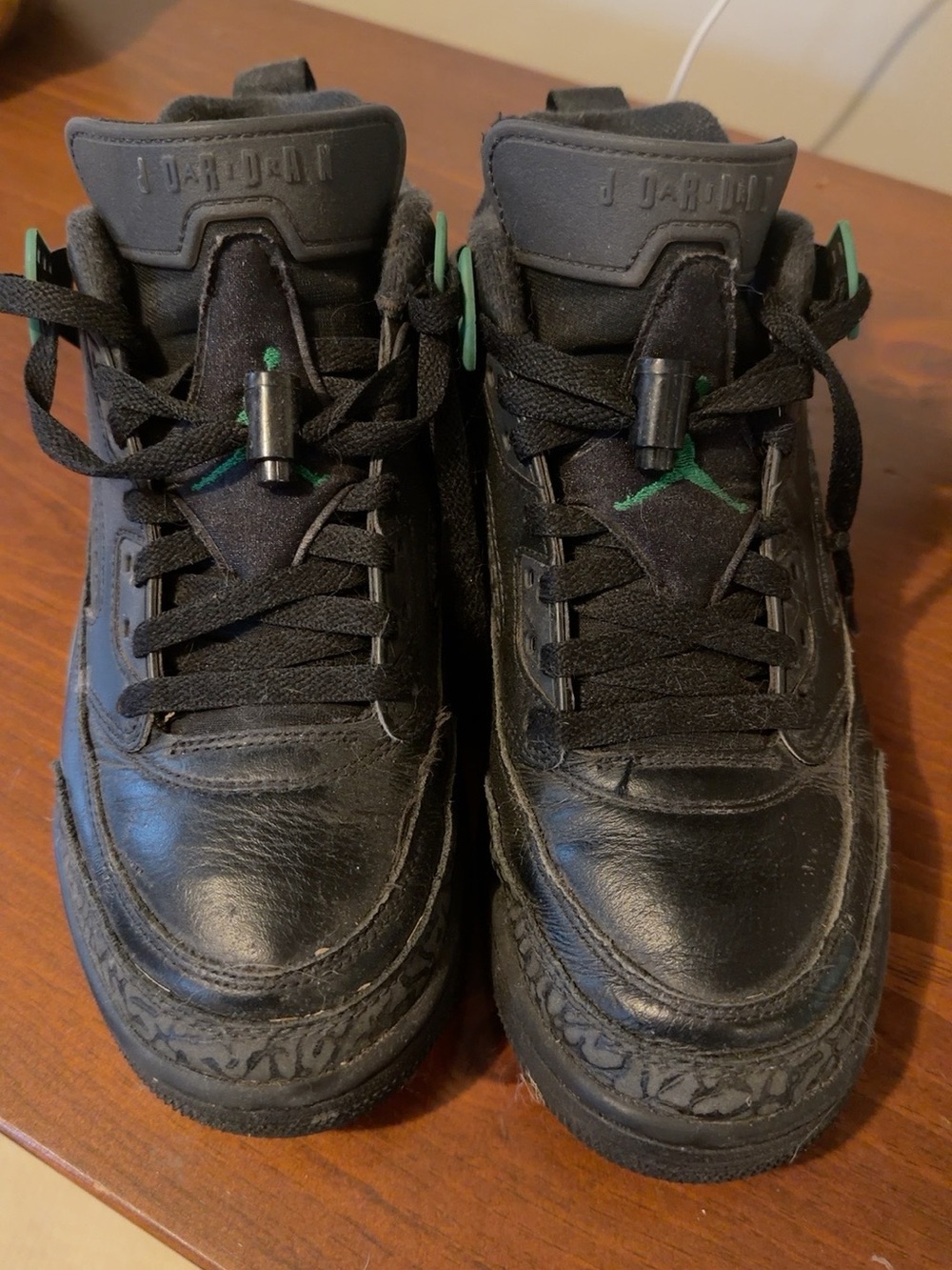Nike Black Sneakers with Green Jumpman Accents